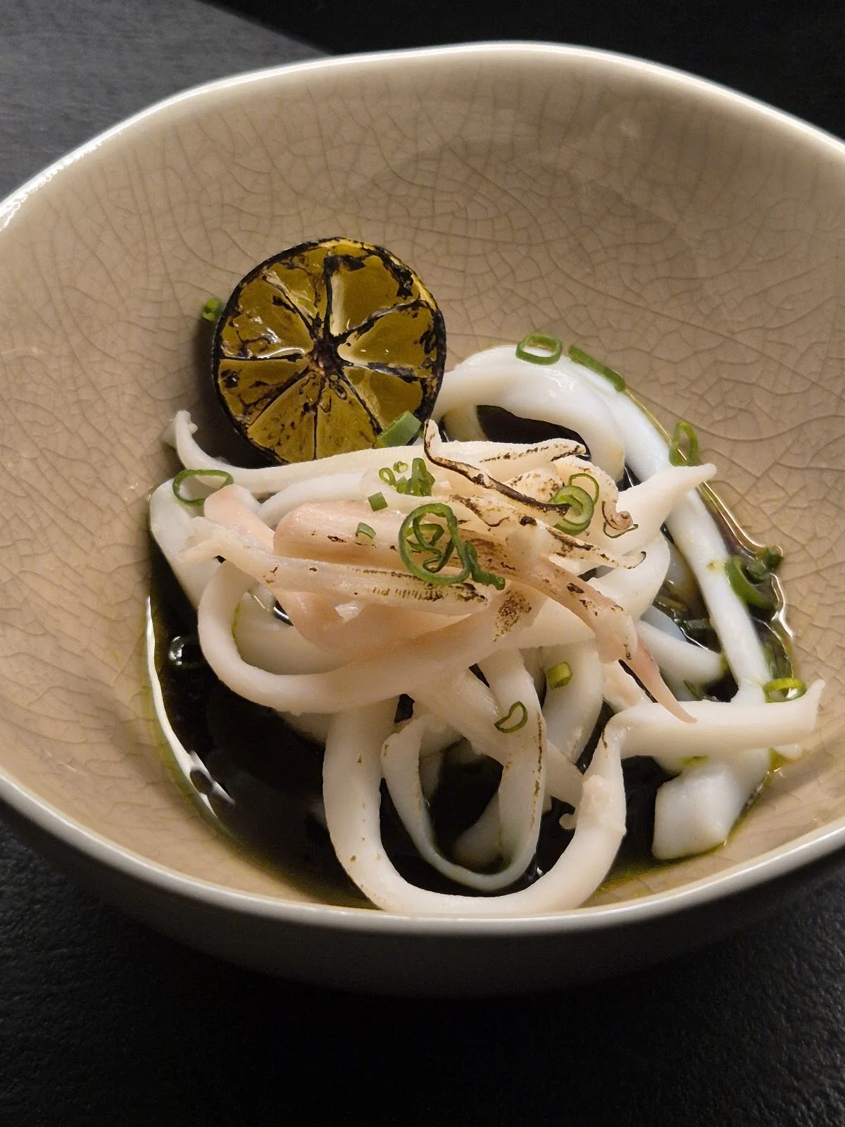 Squid in a crackle-glaze bowl