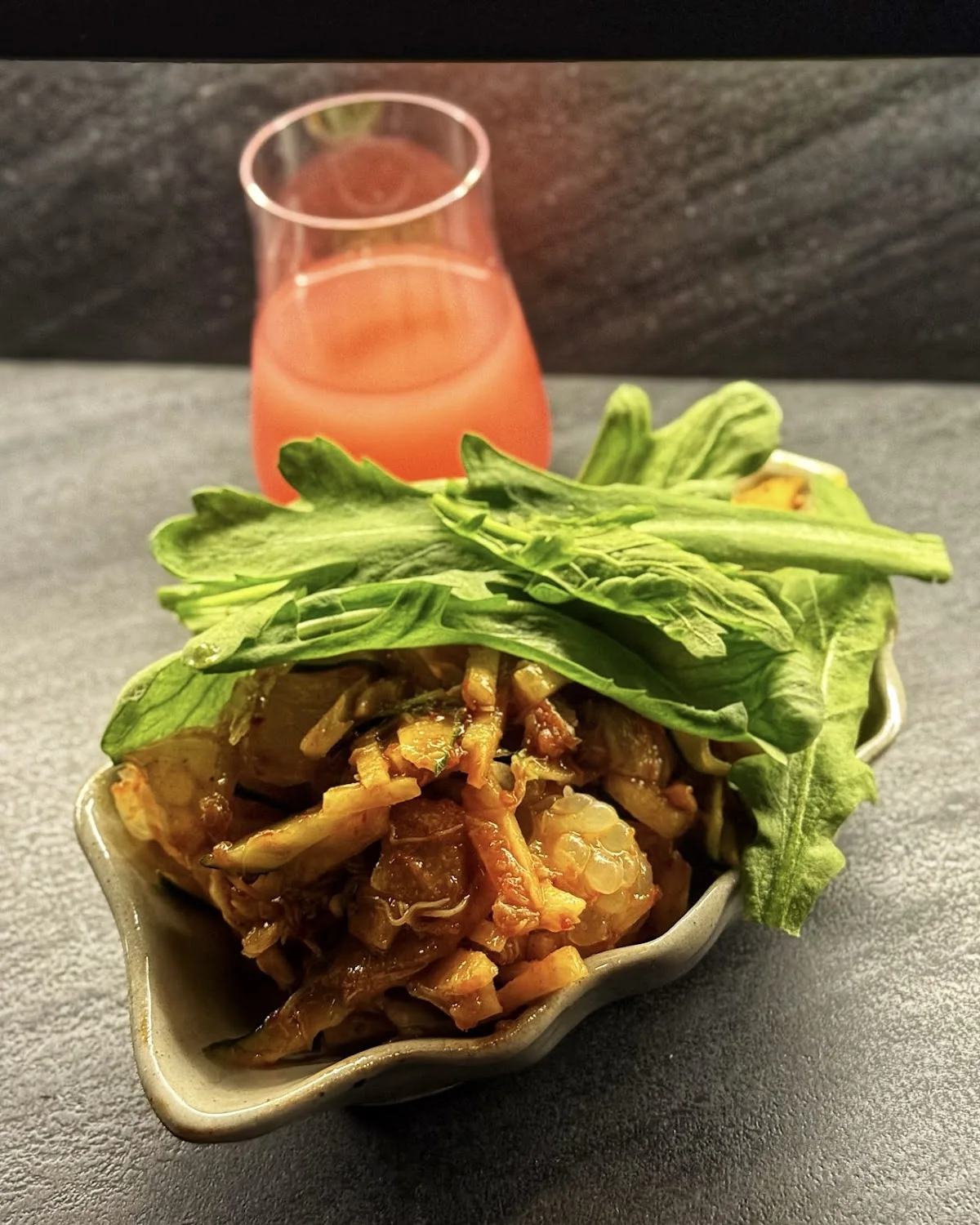 Dish and drink on grey slate